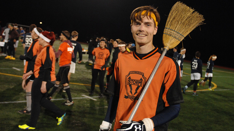 Real-life Quidditch players gathering on a pitch