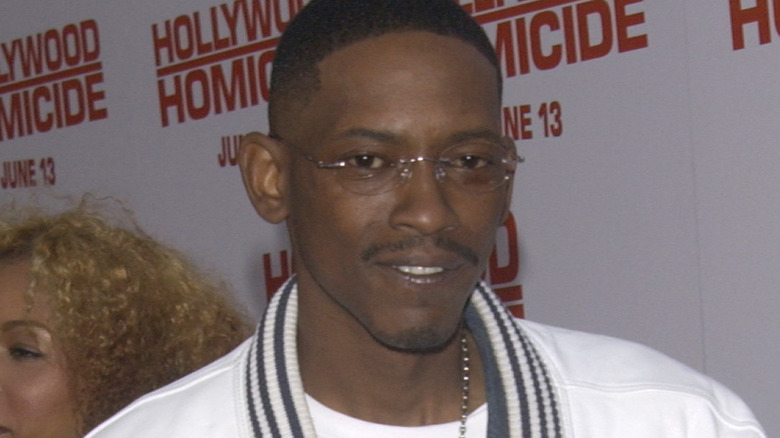 Kurupt wearing glasses