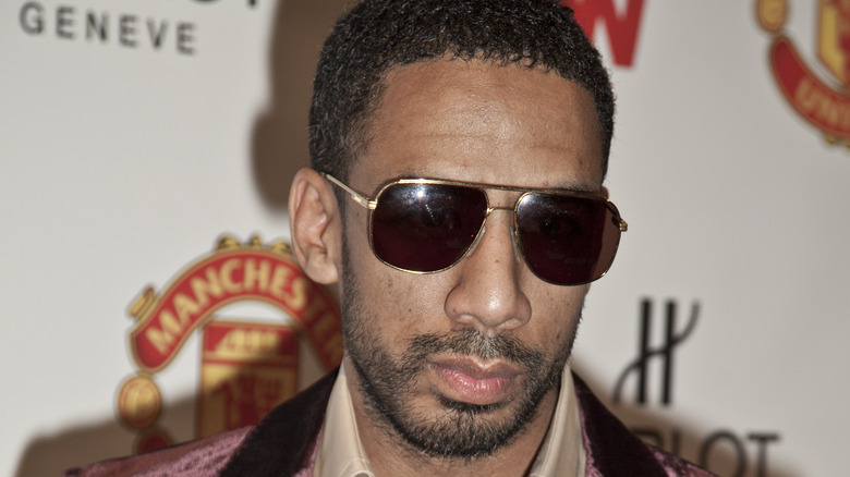 Ryan Leslie sad in sunglasses