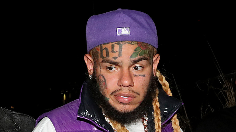 Tekashi 6ix9ine purple hat face tattoos