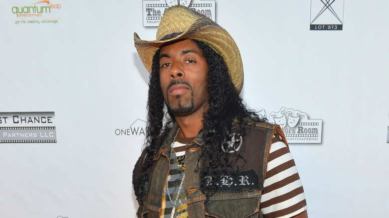 Ahmad Givens﻿﻿ cowboy hat goatee at event