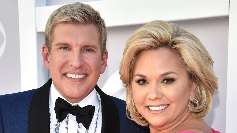 Todd Julie Chrisley smiling at event