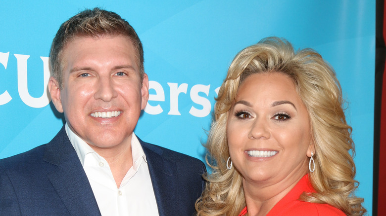 Todd Julie Chrisley smiling at event