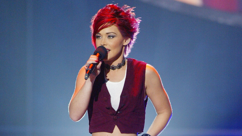 Nikki McKibbin red hair mic performing American Idol