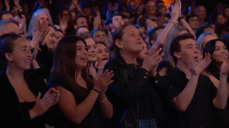 America's Got Talent audience members clapping and cheering