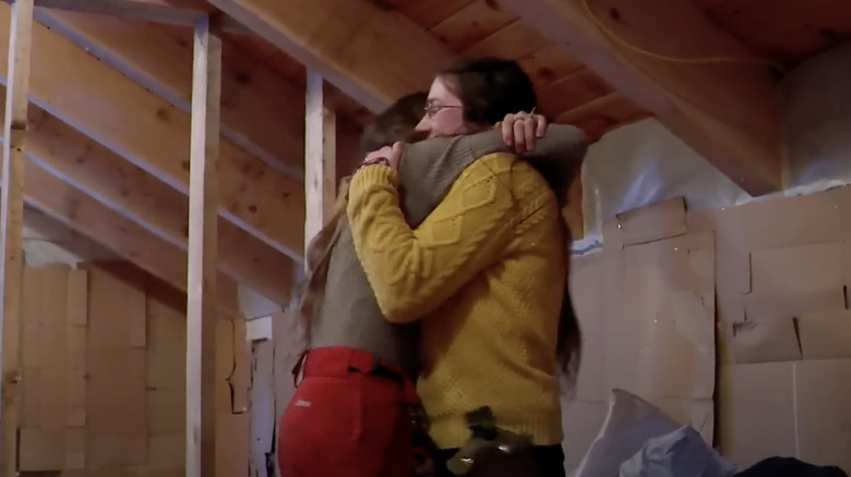 Browns hugging in cabin