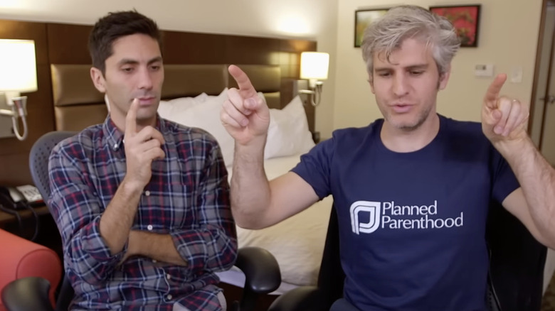 nev schulman and max joseph doing a zoom call on catfish in hotel room