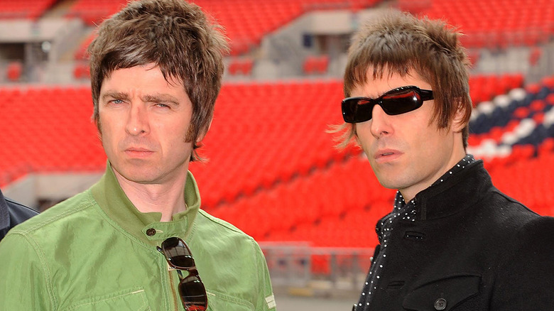 Noel and Liam Gallagher scowling