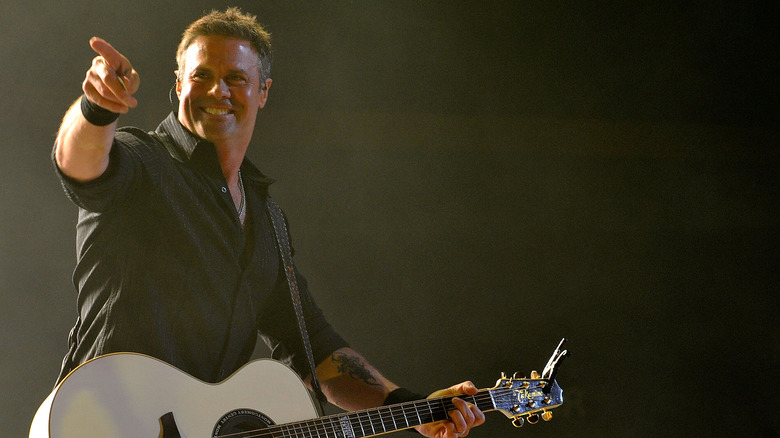 Troy Gentry performing on stage