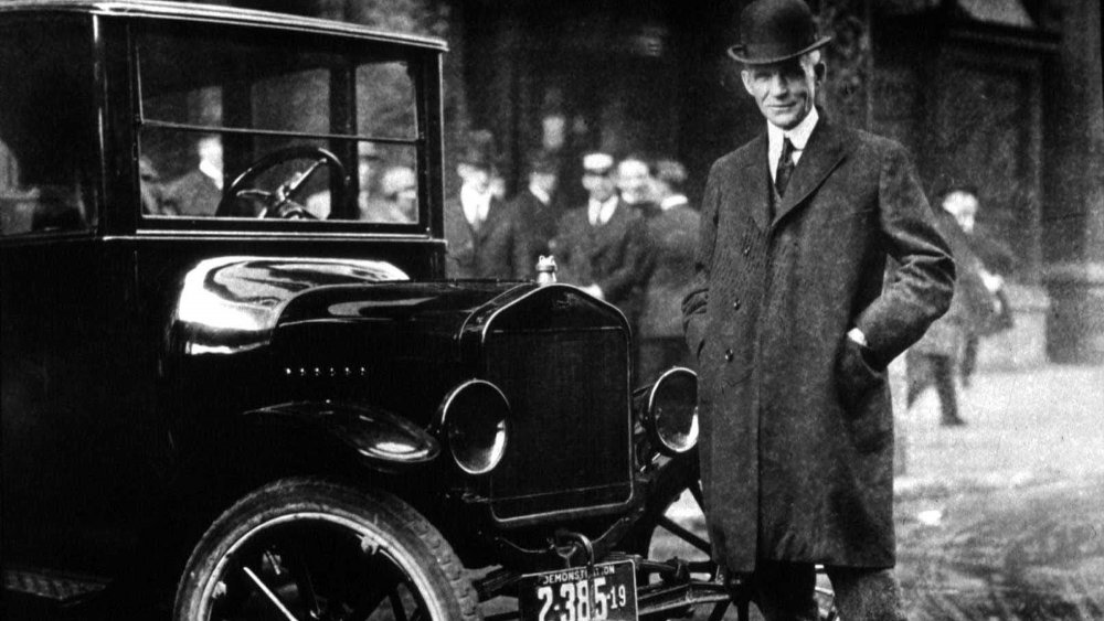 Henry Ford with one of his Model T cars in an undated photo