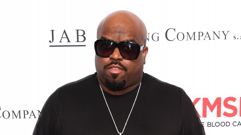 Cee Lo Green black shirt sunglasses posing event