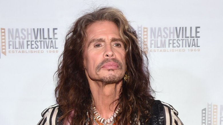 Steven Tyler long hair event pouting