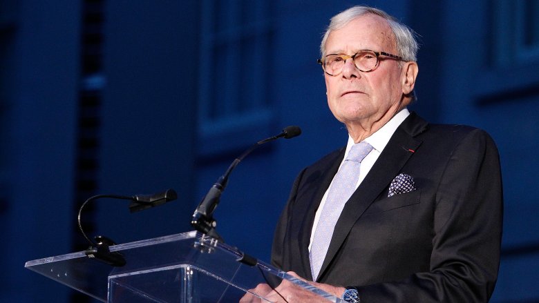 tom brokaw speaking at a lecturn