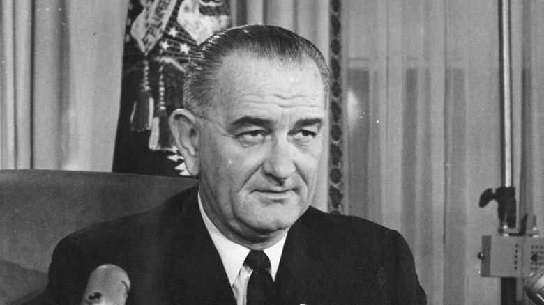 lyndon johnson sitting at desk