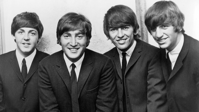 The Beatles smiling