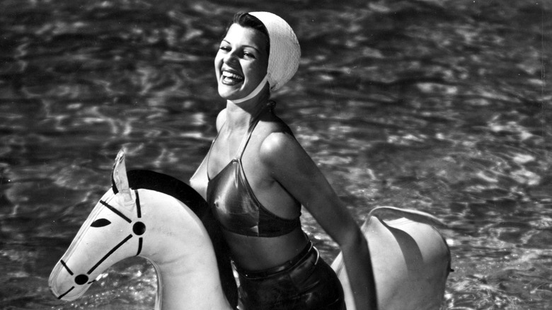 Rita Hayworth in the pool