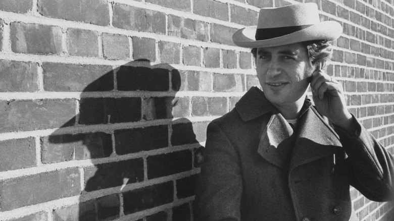 Robert Downey Sr. hat brick wall with shadow