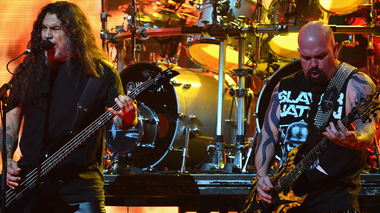 Slayer members Tom Araya and Kerry King performing live