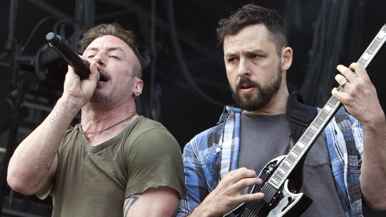 Greg Puciato and Ben Weinman performing in Charlotte, NC