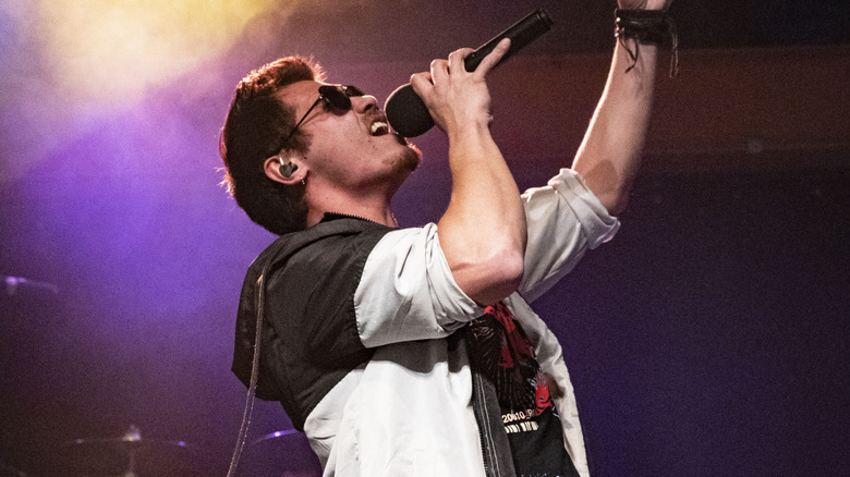 Fuel's John Corsale singing and gesturing on stage at the Musikfest Cafe in 2021