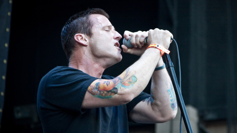 Zoli Téglás singing for Pennywise on stage at the Cypress Hill Smokeout in 2009