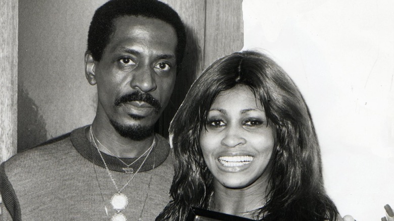 ike turner scowling tina turner smiling