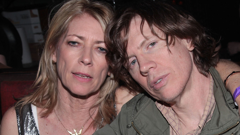 thurston moore head tilted into kim gordon