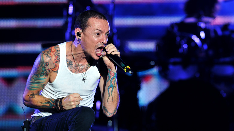 Chester Bennington singing on stage in 2011