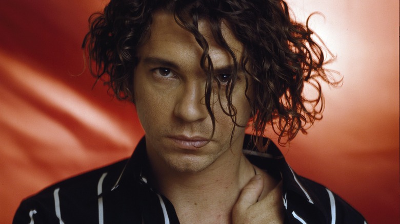 Michael Hutchence staring down the camera