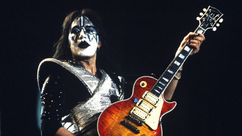 Ace Frehley performing with KISS in 1996