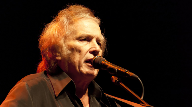 Don Mclean sings into microphone