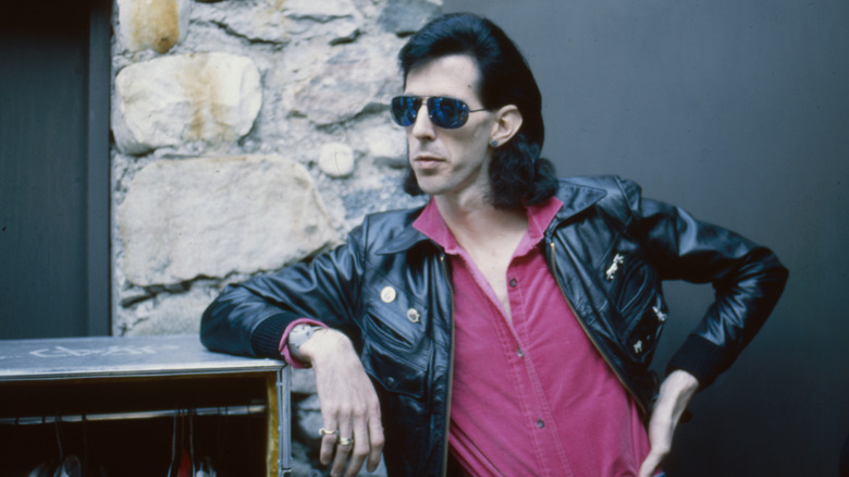 ric ocasek leans sunglasses leather jacket leaning on arm