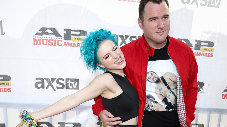 Hayley Williams and Chad Gilbert posing on the red carpet at an event