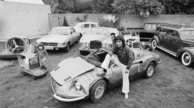 Keith Moon and daughter Mandy pictured with his car collection