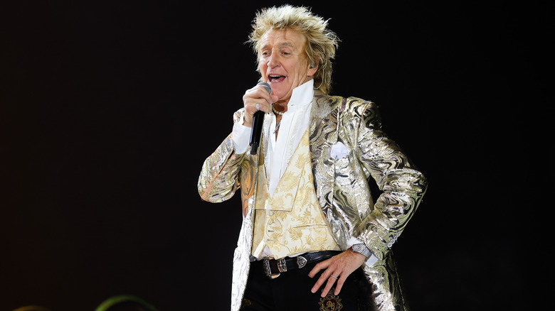 Rod Stewart performing onstage during a concert