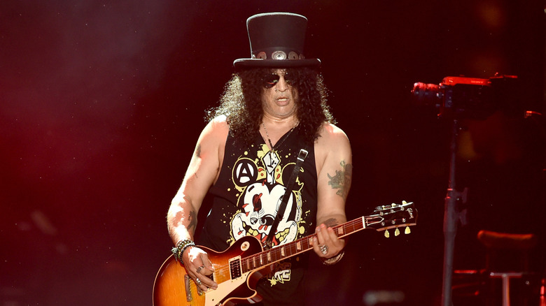 Slash playing guitar at Coachella in 2016