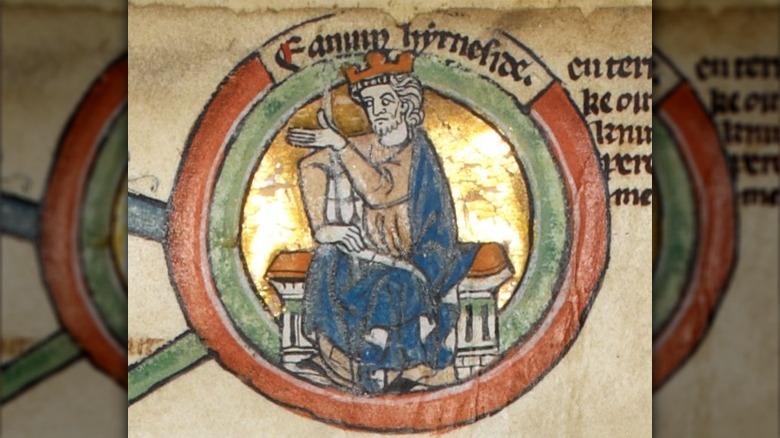 edmund ironside sitting with hand out crown