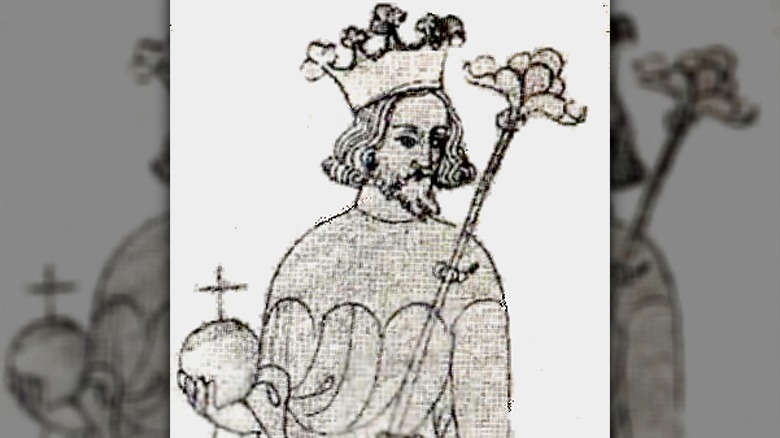 king john holding staff orb crown