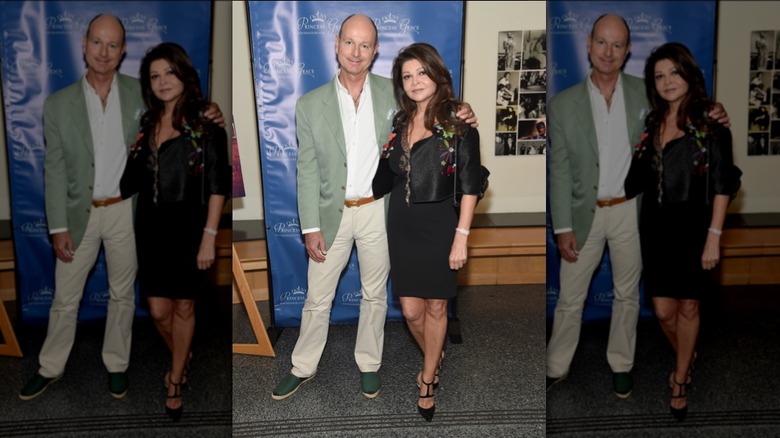 Prince Dimitri with wife at event