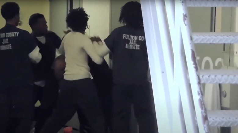 Screen grab from video of Blood inmates fighting