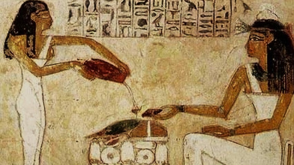 hieroglyph of Egyptian women pouring wine
