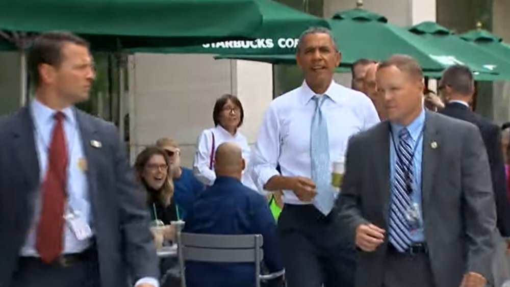 Obama walking coffee secret service agents