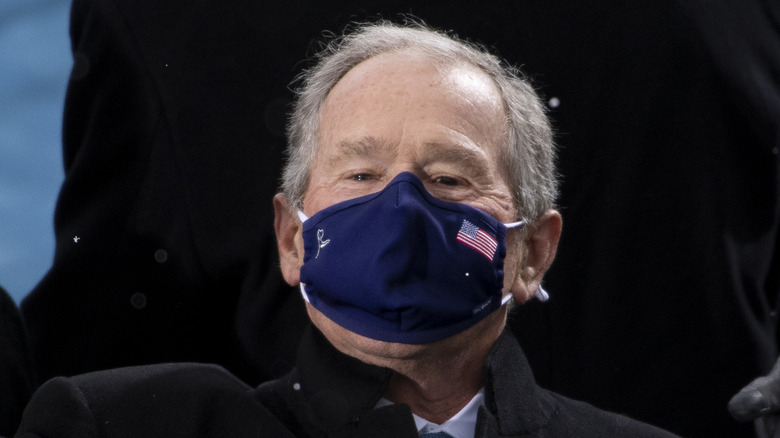 George W. Bush wearing mask