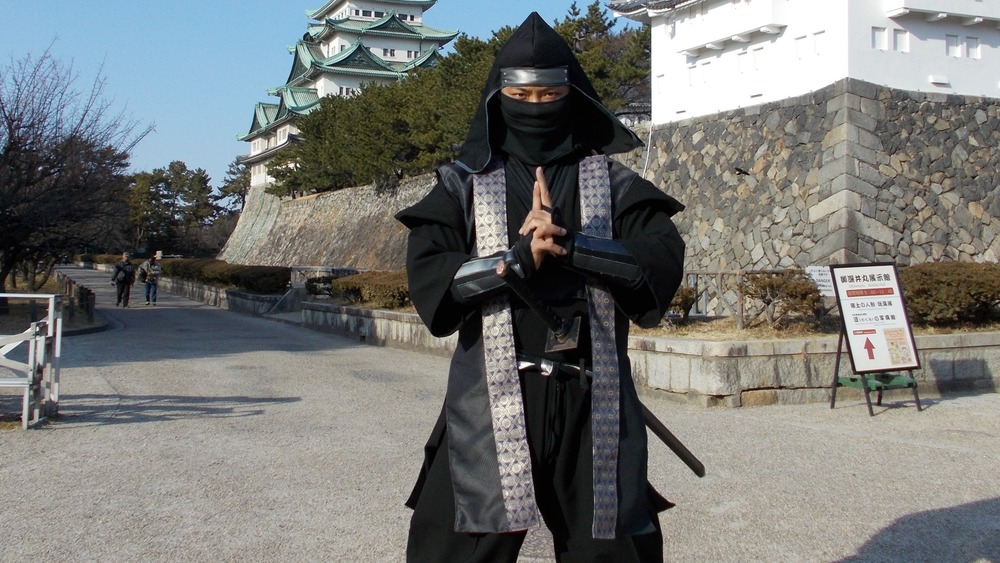 a ninja in black costume