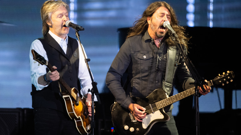 Paul McCartney performing with Dave Grohl