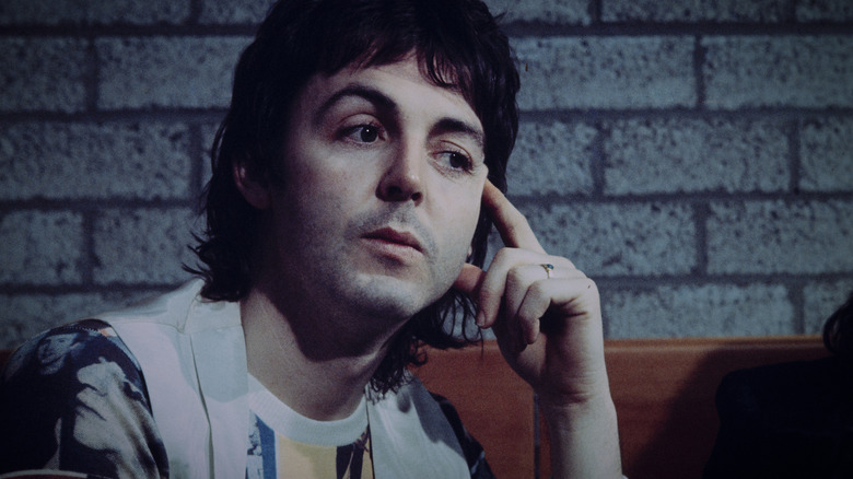 young Paul McCartney sitting for an interview