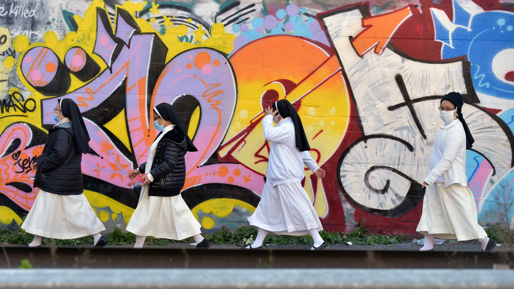 Nuns in Rome showing solidarity for an artist