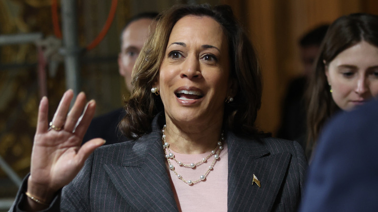 Kamala Harris waves after casting tie-breaking vote in Senate chamber