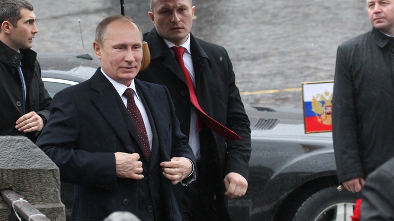 Putin surrounded by bodyguards