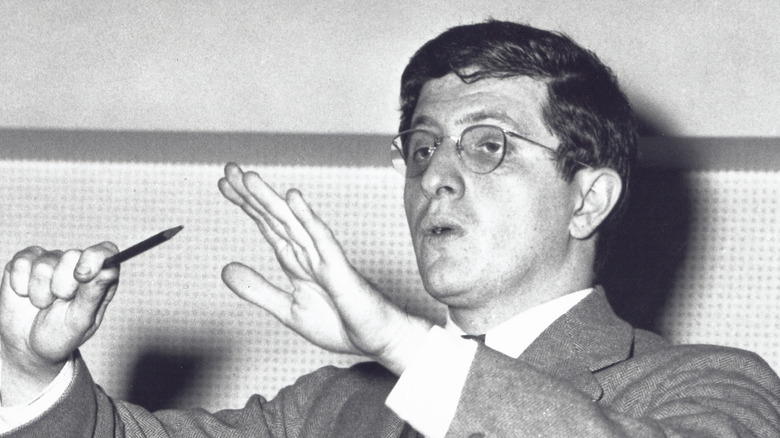 Bernard Herrmann conducting with a pen